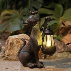 IVCOOLE cat statue with solar lantern lighting at dusk for outdoor ambience