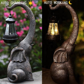 IVCOOLE IP44 waterproof elephant statue standing strong in outdoor weather.