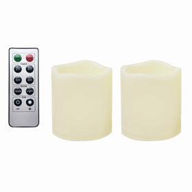 iZAN two-pack waterproof outdoor LED pillar candles with remote control for patio ambiance.