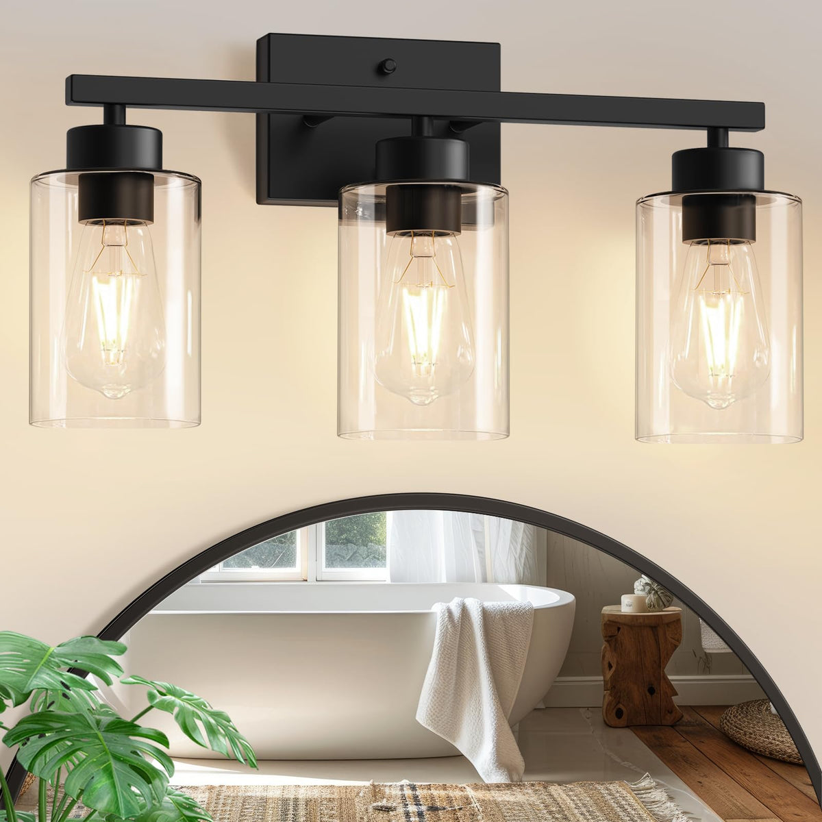 IZORRO 3-light vanity fixture in matte black with clear glass shades for stylish bathroom lighting