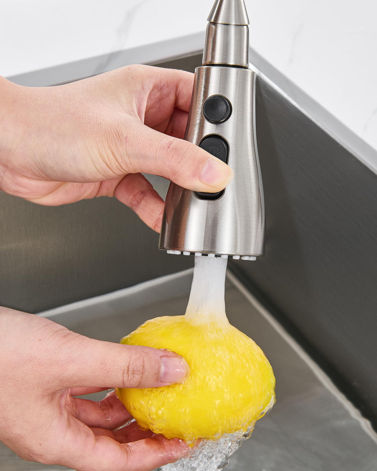 J-HVA sprayer head spray mode handles rinsing produce with wide coverage.