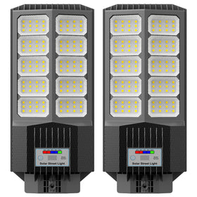 Jadisi solar street light on a pole provides clear driveway illumination and security.