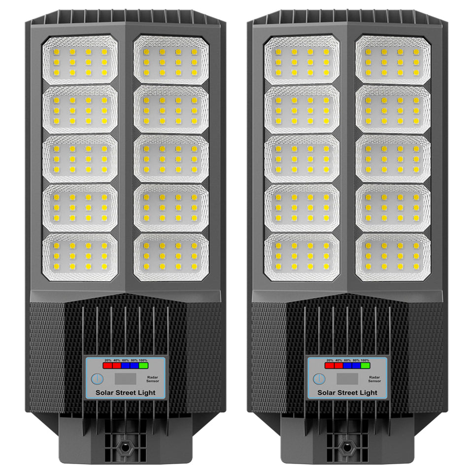 Jadisi solar street light on a pole provides clear driveway illumination and security.