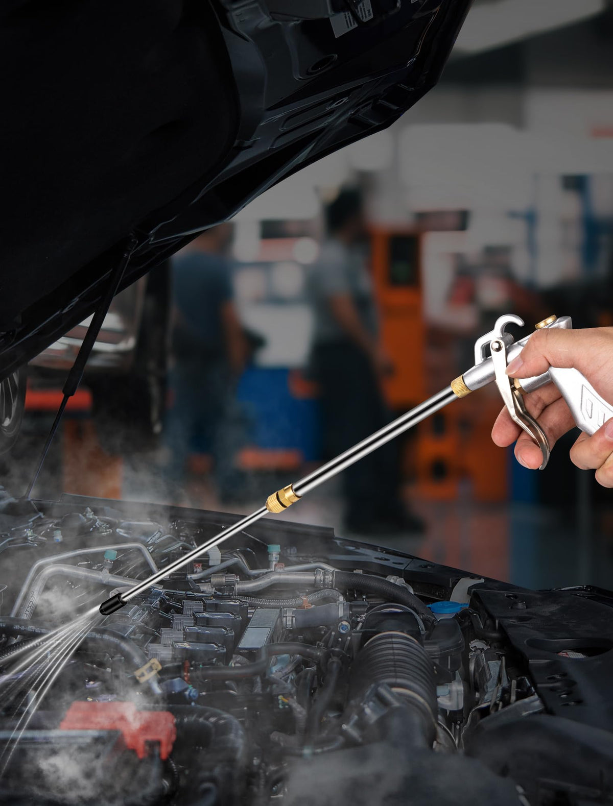 Close-up of dust being blown away by the JASTIND air blow gun
