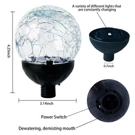 Jesokiibo cracked glass ball light in garden glows beautifully at dusk.