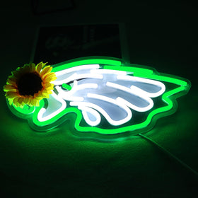 JFLLamp Eagles neon sign creates a bold focal point in a bedroom setup.
