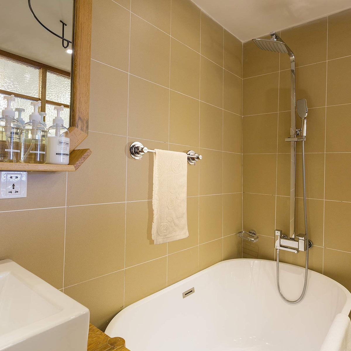 Compact 16-inch towel bar installed above toilet or beside shower.