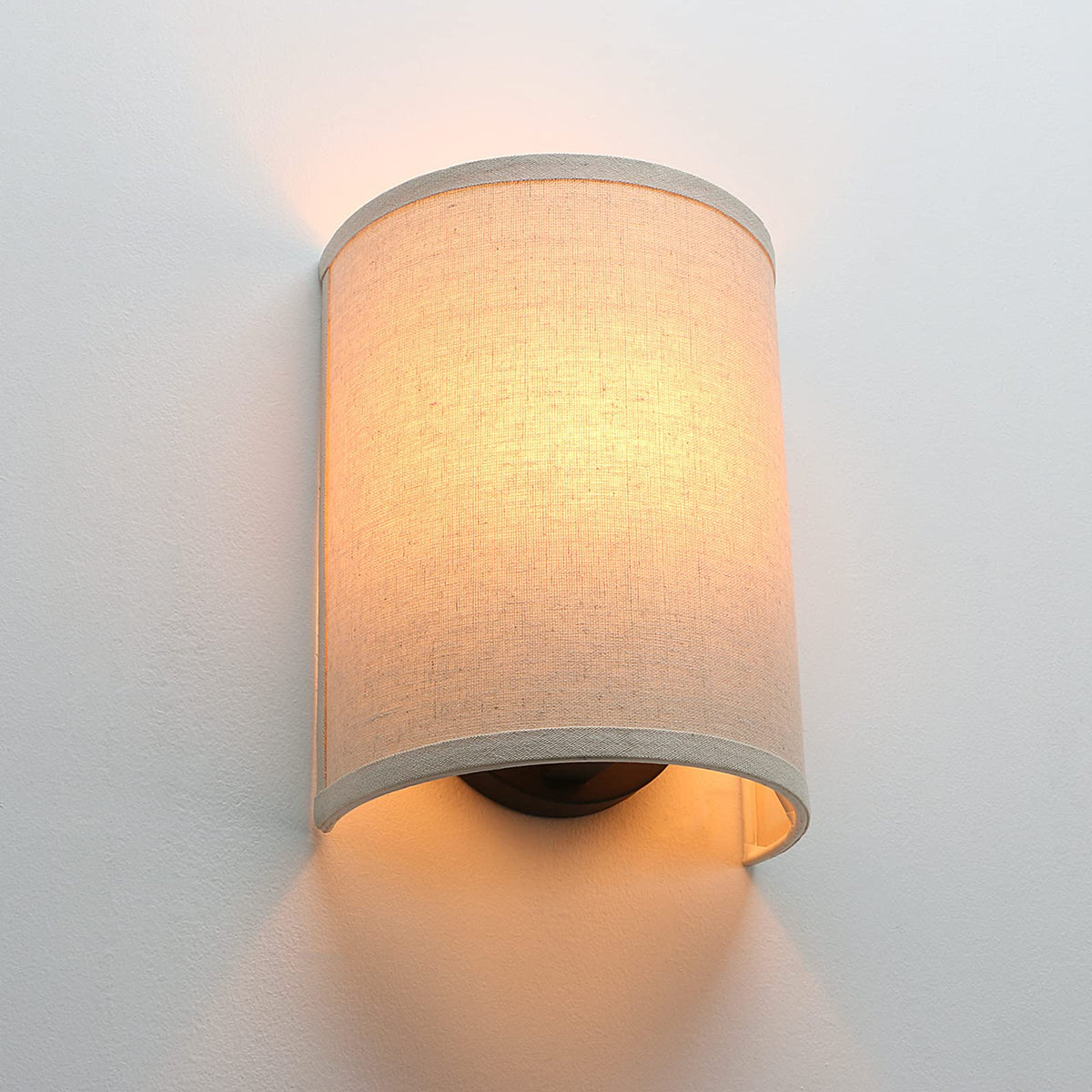 Detail of JIMUBEAM wall sconce metal frame complements rustic interiors
