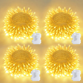 JMEXSUSS four-pack 50-LED outdoor lights illuminate the patio with a warm glow.