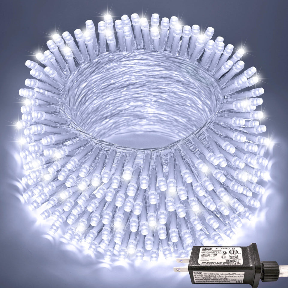 JMEXSUSS 66ft 200-LED white Christmas lights outline rooflines with inviting glow.