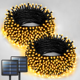 JMEXSUSS outdoor solar string lights two-pack glow warmly along a patio