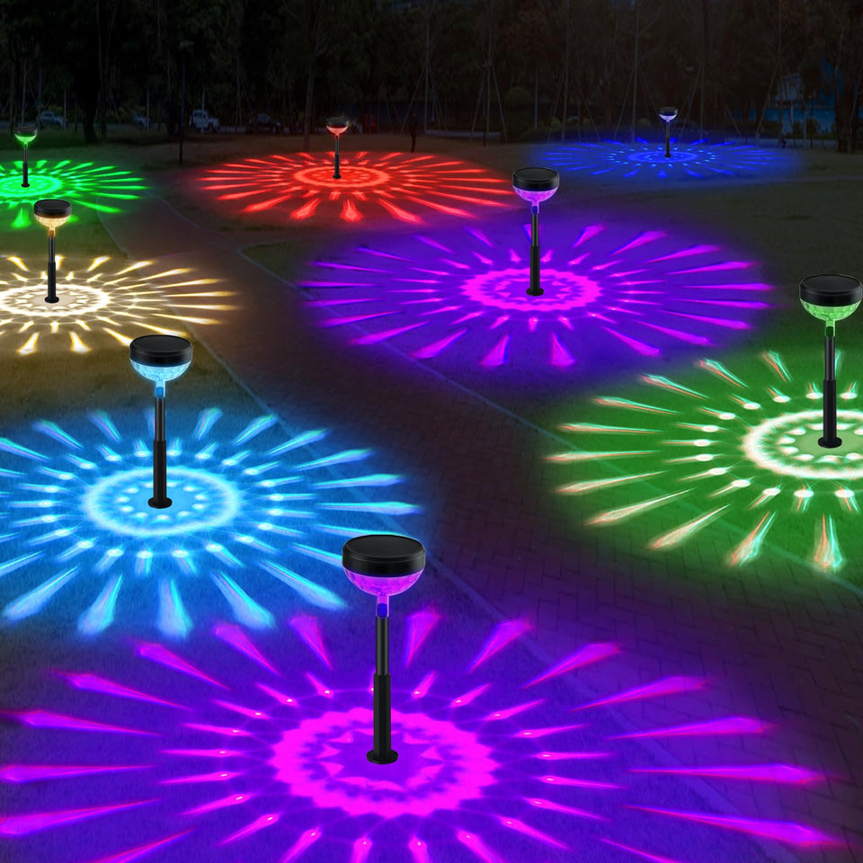 JNOEC 8-pack solar pathway lights along a garden path provide warm, inviting ambience.