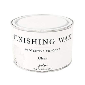 Jolie Clear Finishing Wax bottle close-up shows odor-free furniture protection.