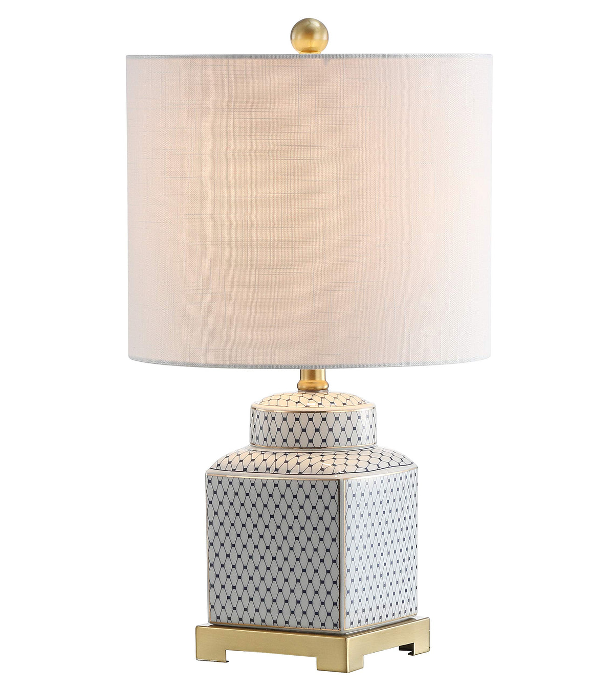 JONATHAN Y ginger jar lamp with brass base adds blue-and-white elegance to any living room.