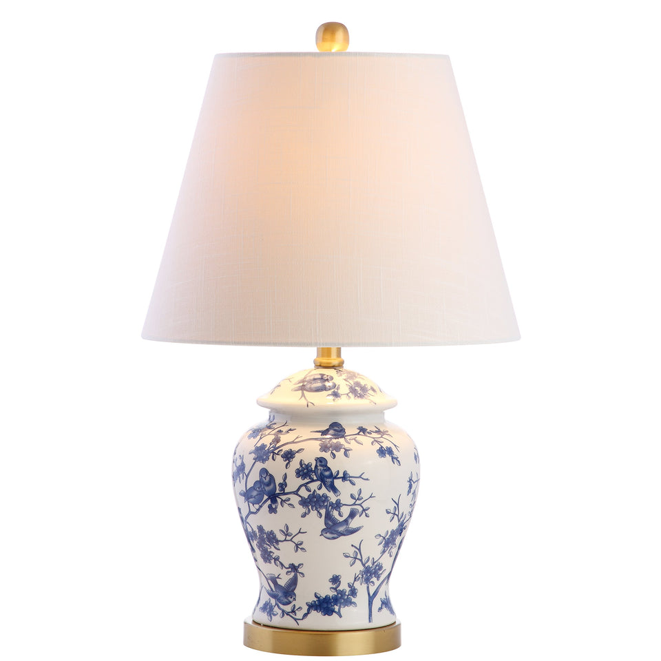 Jonathan Y 22-inch blue and white ceramic table lamp for elegant living room ambience.