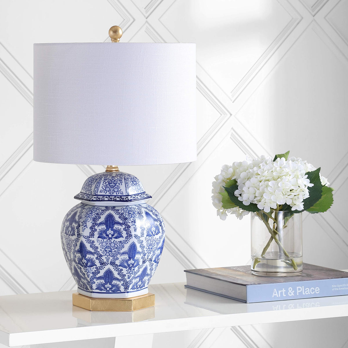 JONATHAN Y 25-inch table lamp fits bedside and console setups.