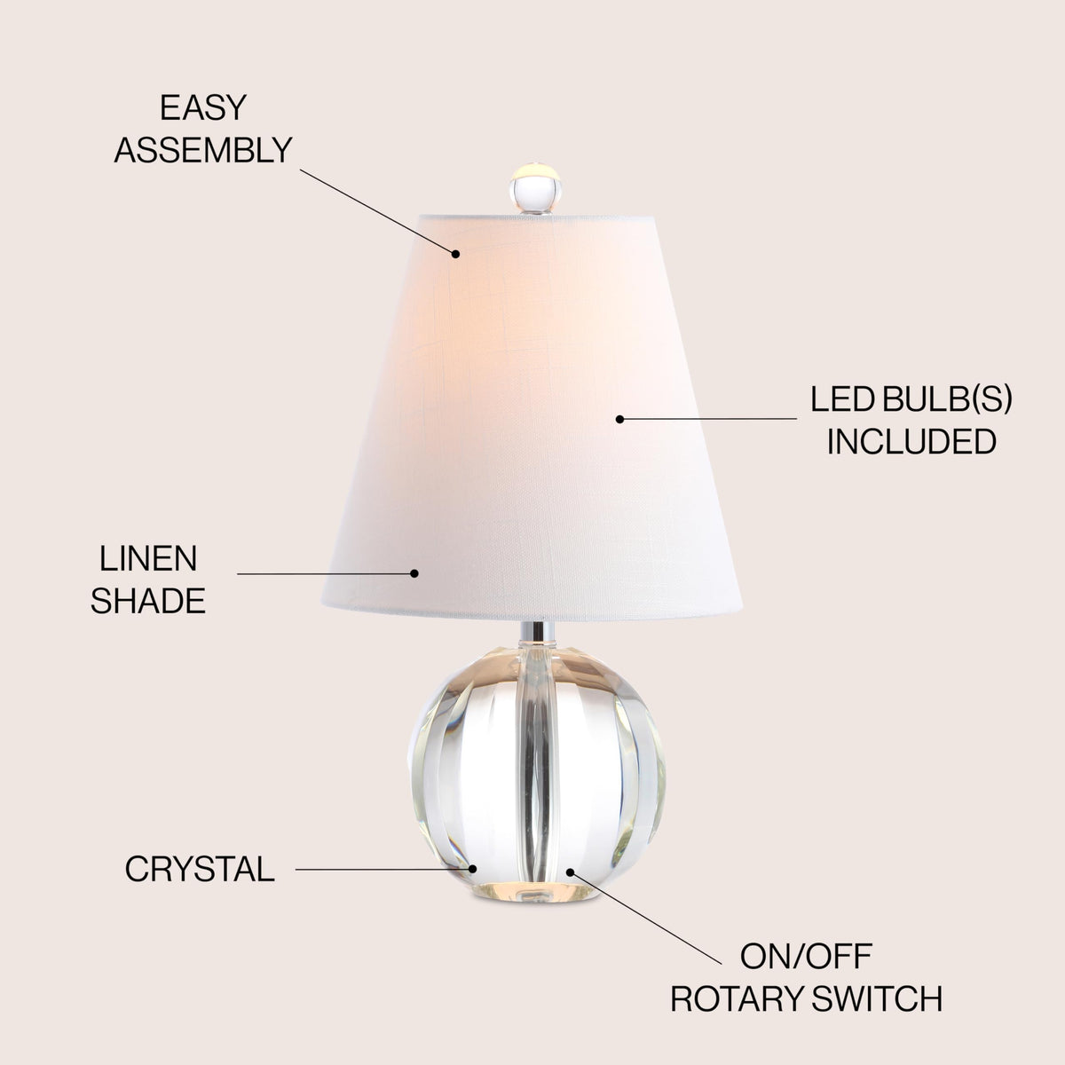JONATHAN Y bedside lamp on a nightstand offers warm task lighting.