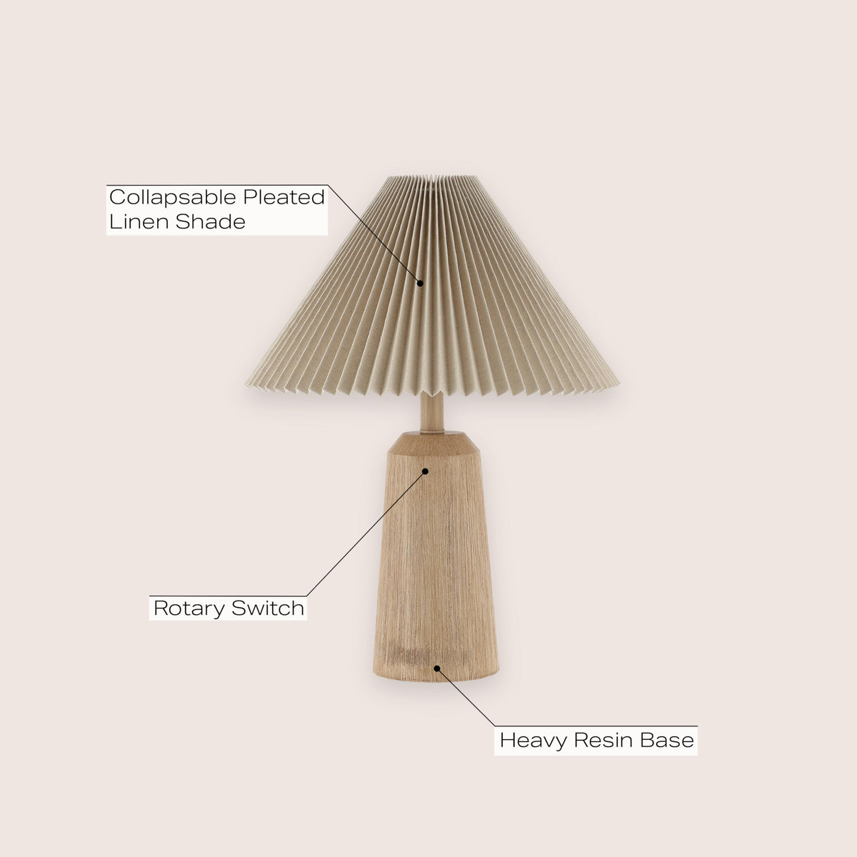 JONATHAN Y lamp with black pleated shade enhances a living space.
