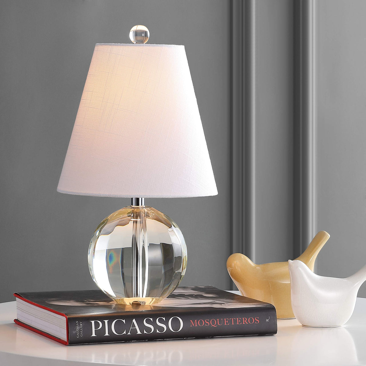 JONATHAN Y crystal orb detail enhances ambient lighting with glam appeal.