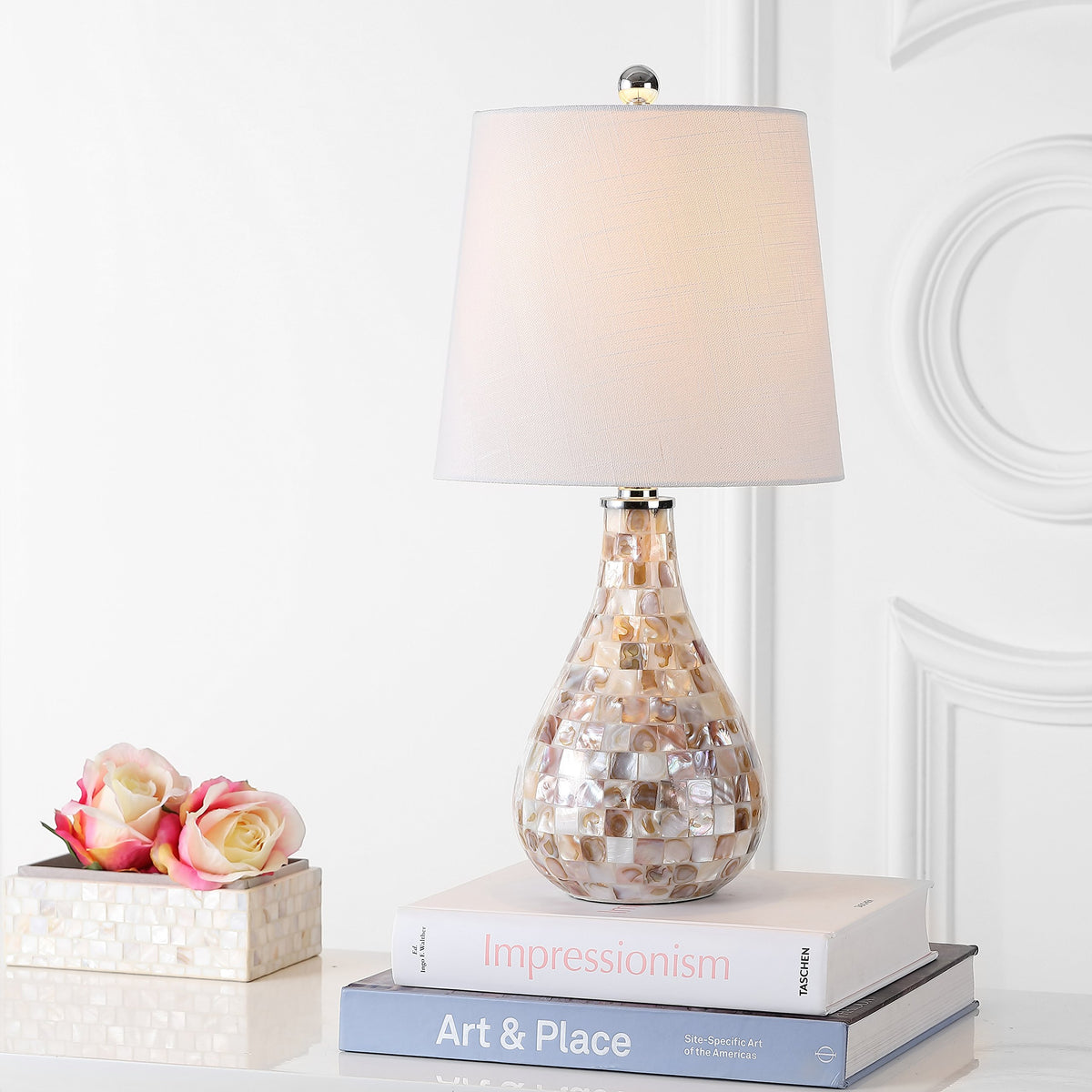 JONATHAN Y mother-of-pearl-mosaic-finish elevates bedside decor with a warm glow.