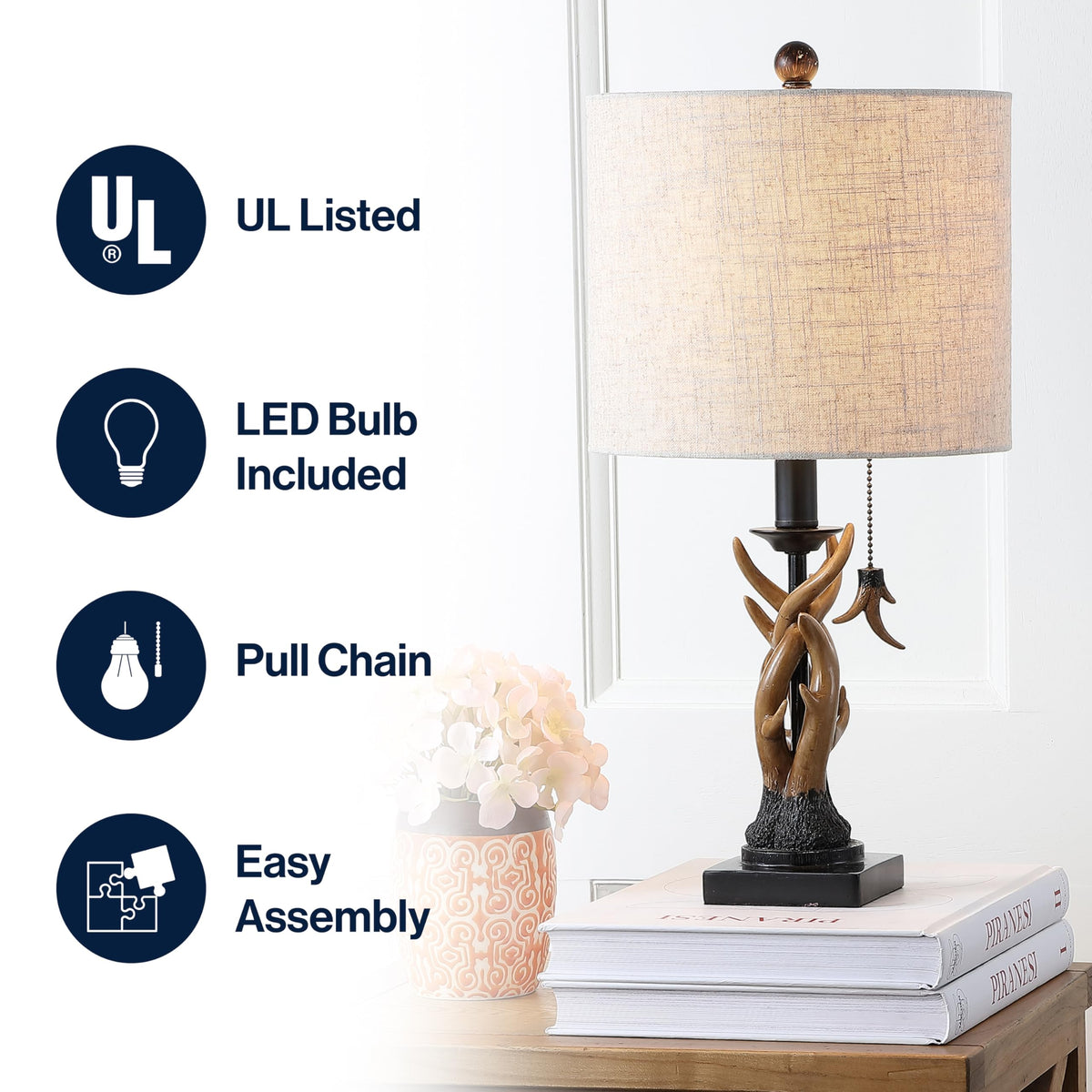 JONATHAN Y resin antlers detail adds a rustic focal point on a nightstand.