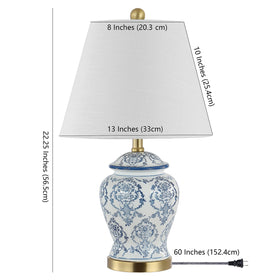 JONATHAN Y urn lamp on a living room surface, showcasing classic styling
