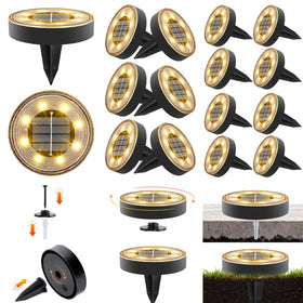 Joomer 16-pack solar ground lights illuminate pathways with warm white glow.