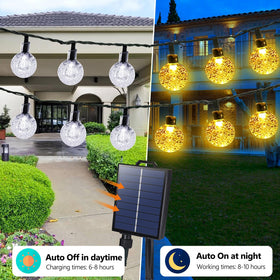 Joomer 100-LED globe lights illuminate a porch at dusk for cozy outdoor vibes