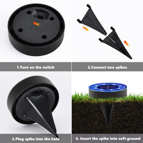 Joomer Solar Ground Light disc blue accenting a lawn edge and flower bed