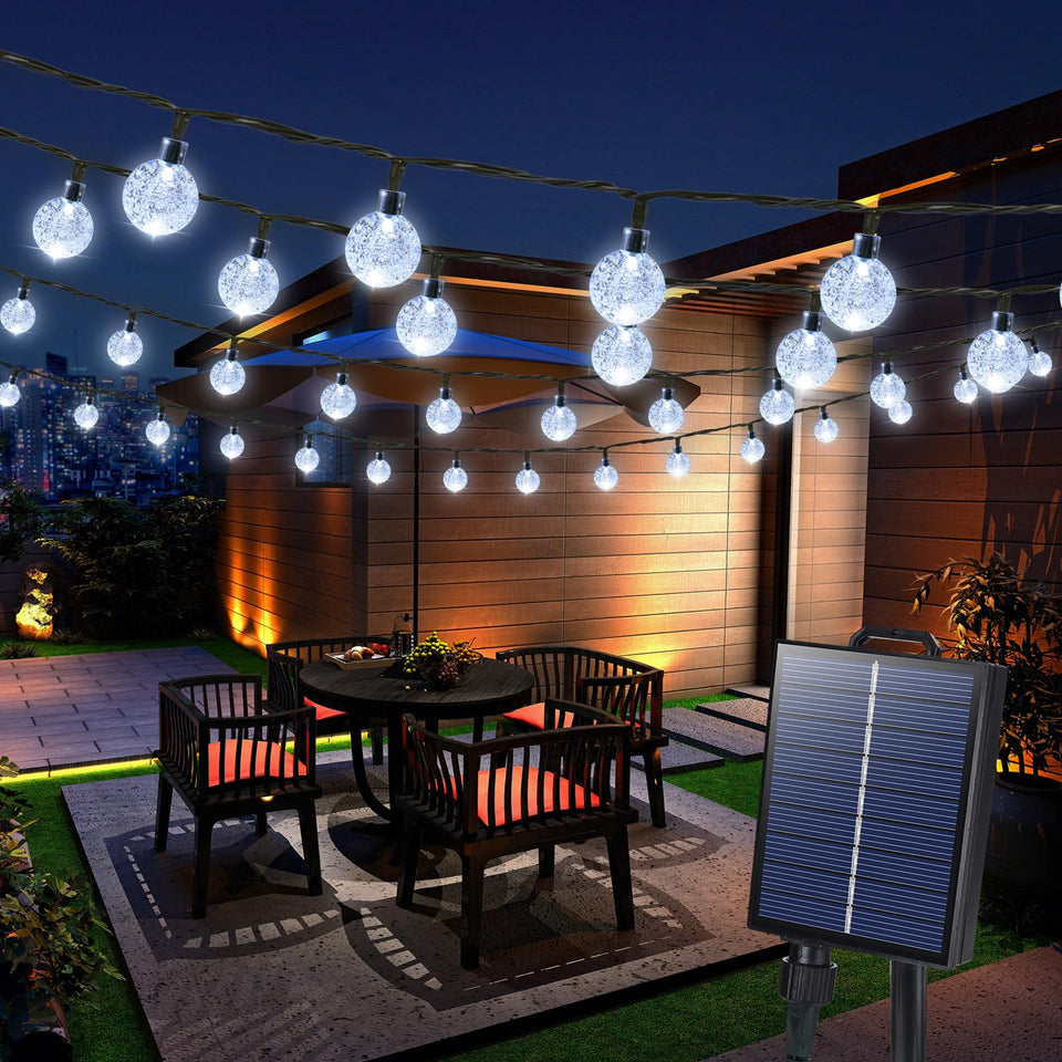 Joomer solar string lights on porch glowing warmly for outdoor evenings