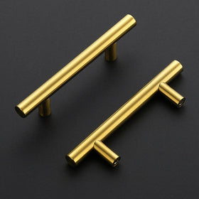 Joy Decor T-shaped brushed brass handle close-up highlights durable construction
