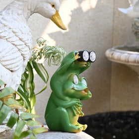 Juliahestia front-yard frog art adds color and whimsy to entryways and porches.