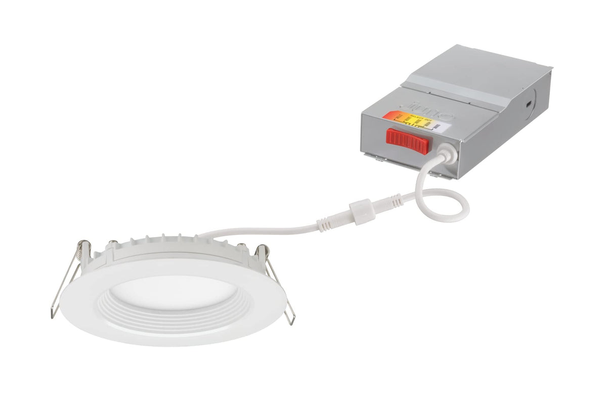 Juno regressed wafer 4-inch downlight with glare-reducing baffle for soft ceilings.