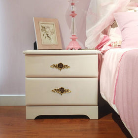 JUXYES ivory floral knob on a dresser example.