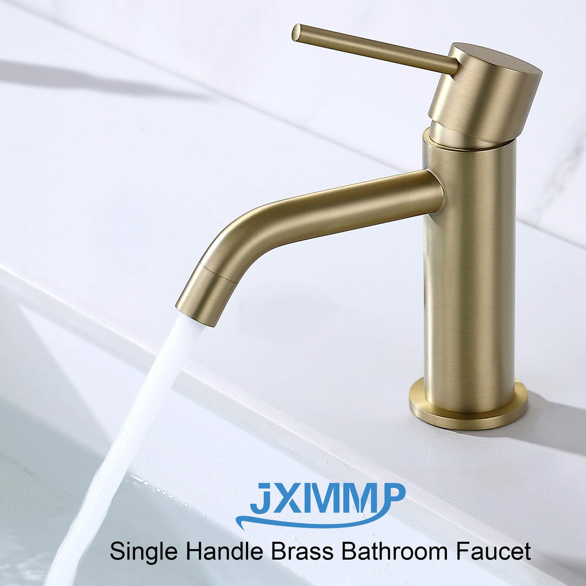 JXMMP brushed gold faucet installed in a modern bathroom setup.