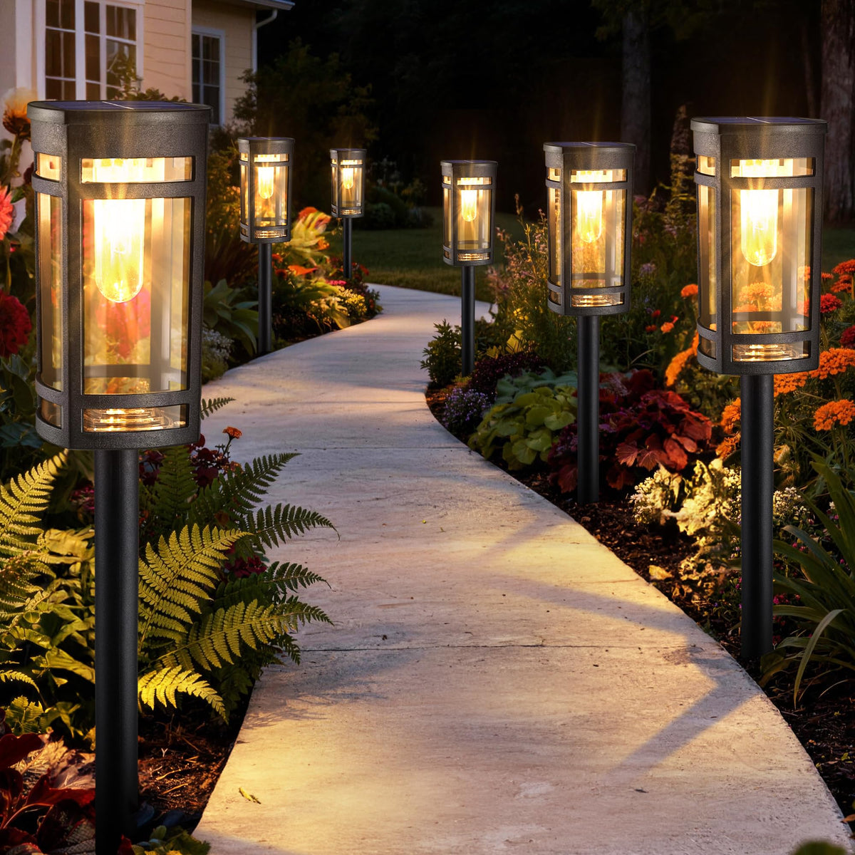 Jyoiat 6-pack pathway lights along garden path with warm dusk glow