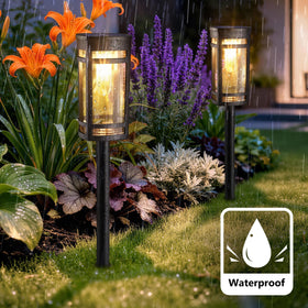Jyoiat square-design pathway lights creating a neat border along the lawn