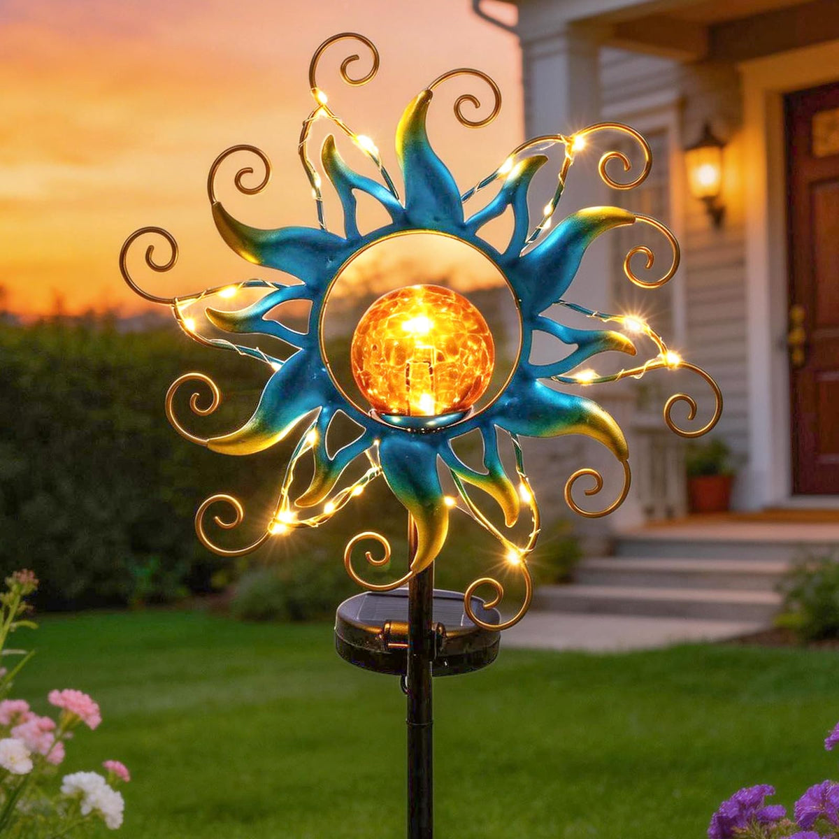 Kacux solar light with blue globe stake brightens pathways at night