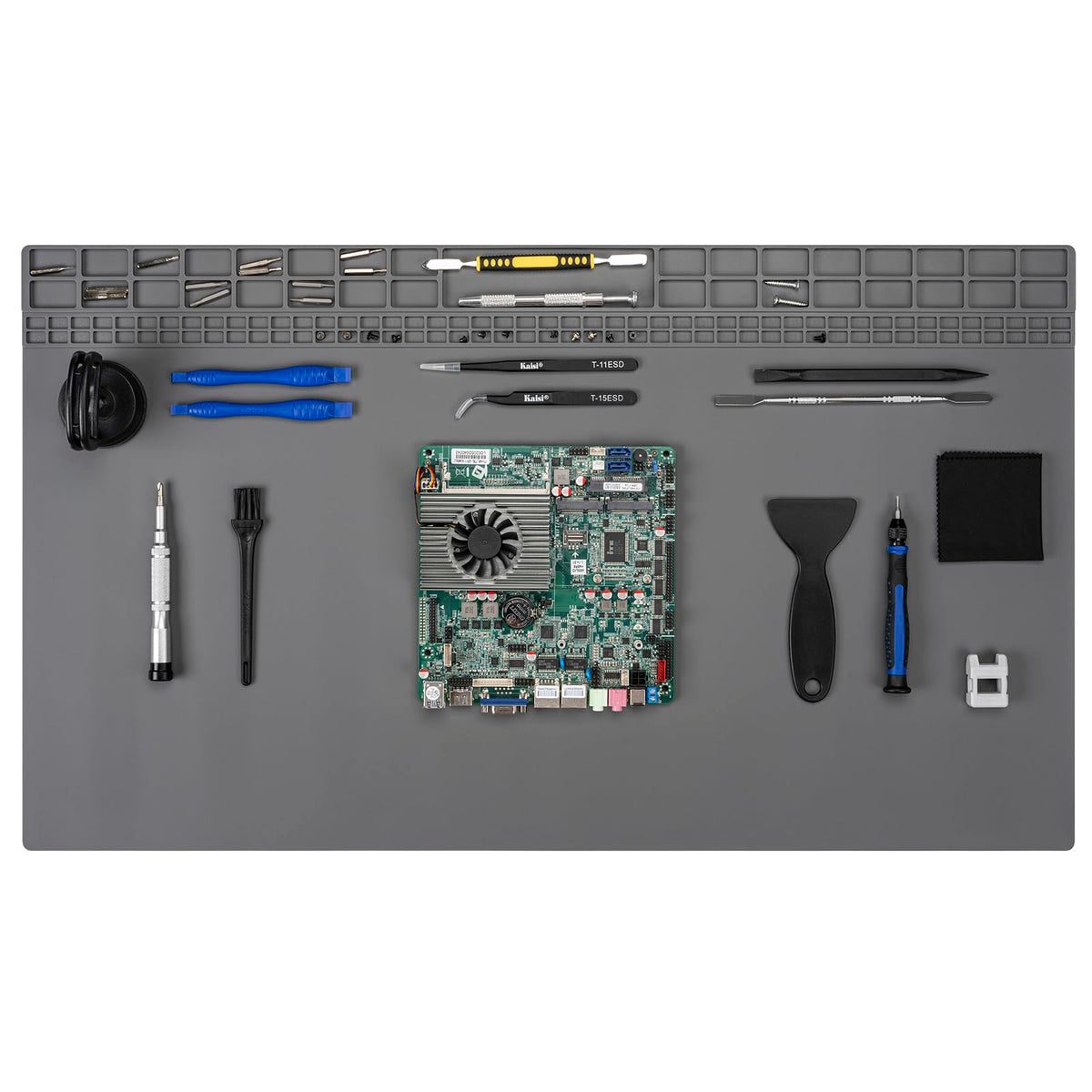 Kaisi extra large soldering mat on a workbench with a spacious electronics repair area