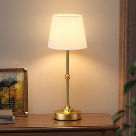 Kakanuo cordless table lamp gold base provides portable illumination for any room.