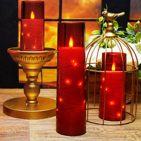 Kakoya red flameless candles serve as a romantic wedding centerpiece.