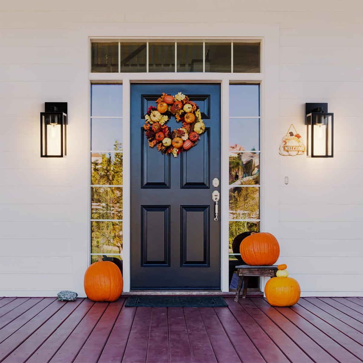 Kalium wall sconce with toughened frame offers durable exterior lighting.