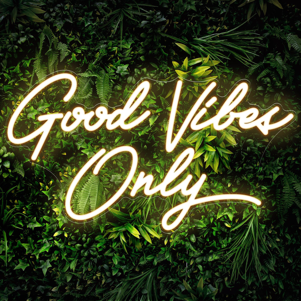 Kavaas Good Vibes Only neon sign on wall adds warm bedroom ambience.