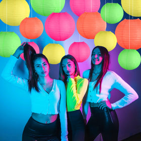 KAXIXI day-lit lanterns in red, green, and pink provide bold color