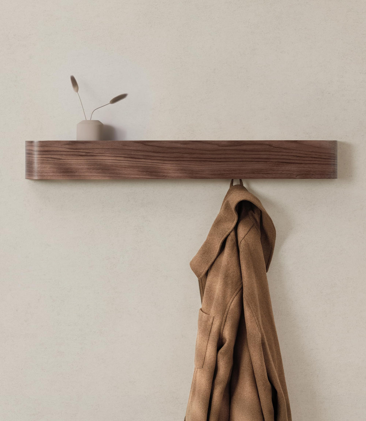 Kazai Toke wall-mounted coat rack with walnut veneer for a sleek entryway.