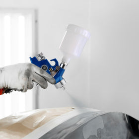 KCNKCN Mini HVLP in automotive touch-up context delivers smooth, controlled finish.