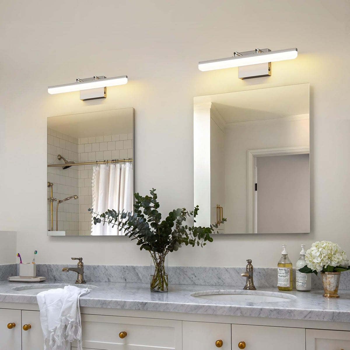 Keliden brushed nickel vanity light in bedroom vanity setup