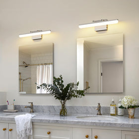 Keliden brushed nickel vanity light in bedroom vanity setup