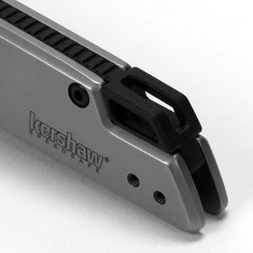 Kershaw Misdirect in-hand view showing slim, compact EDC profile.
