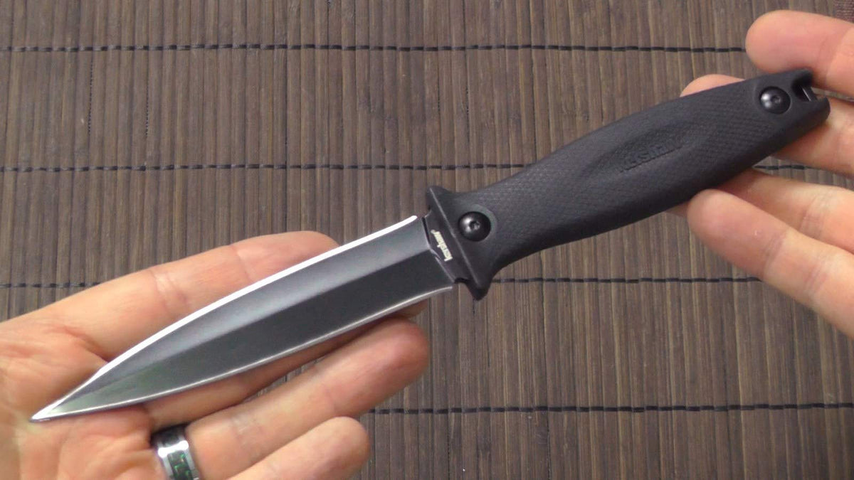 Kershaw Secret Agent full view shows compact fixed blade for EDC.
